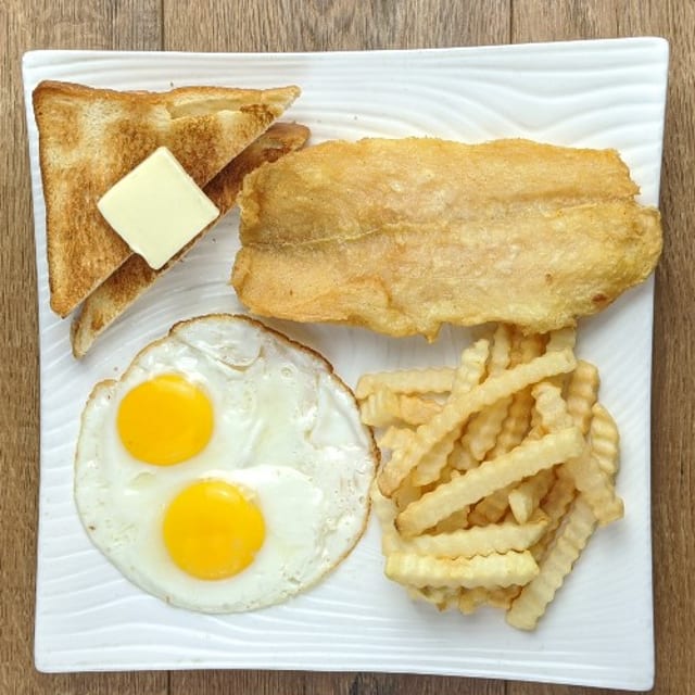 Fried Fish, 2 Eggs, French Fries and Toast.