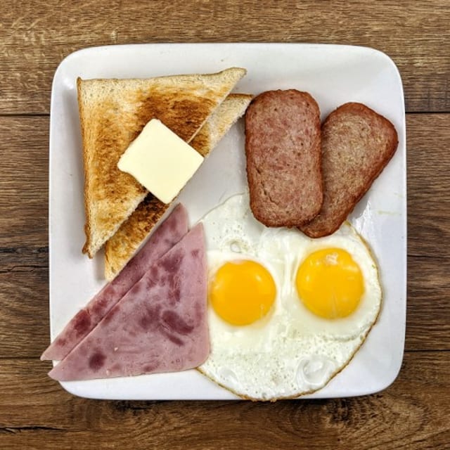 Choice of 2 Meats, 2 Eggs, Breakfast Potatoes and Toast.